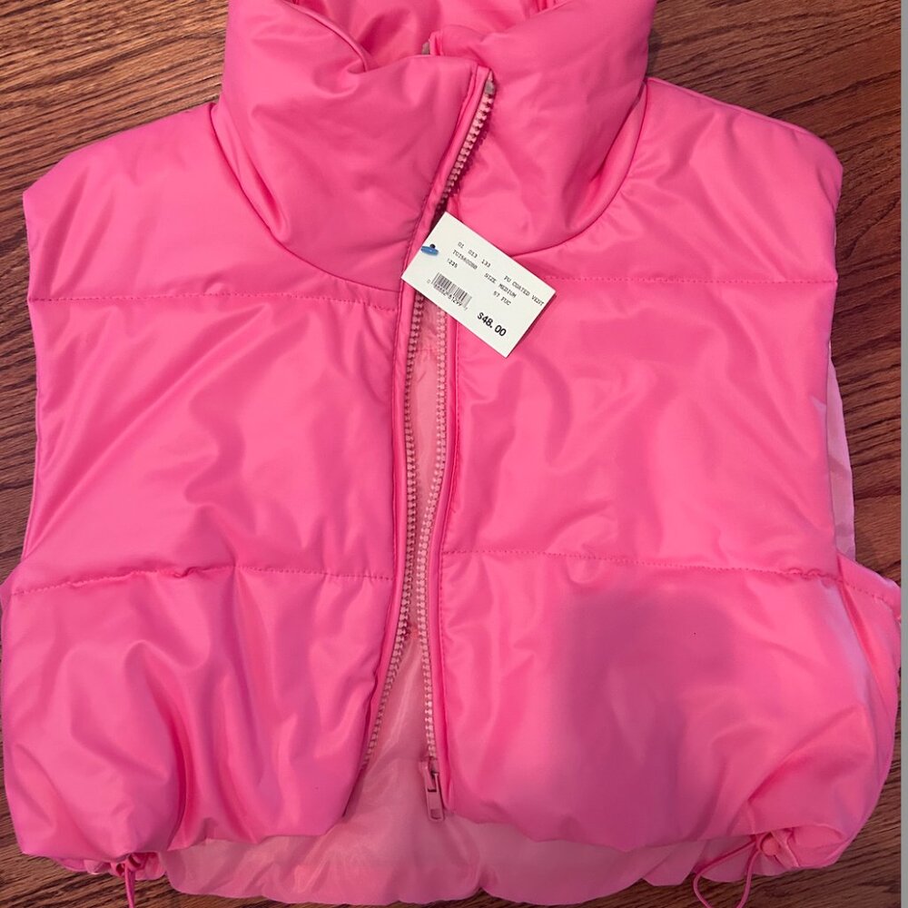 Pink puffy vest